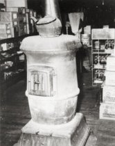 Bailey Brothers store, interior with stove
